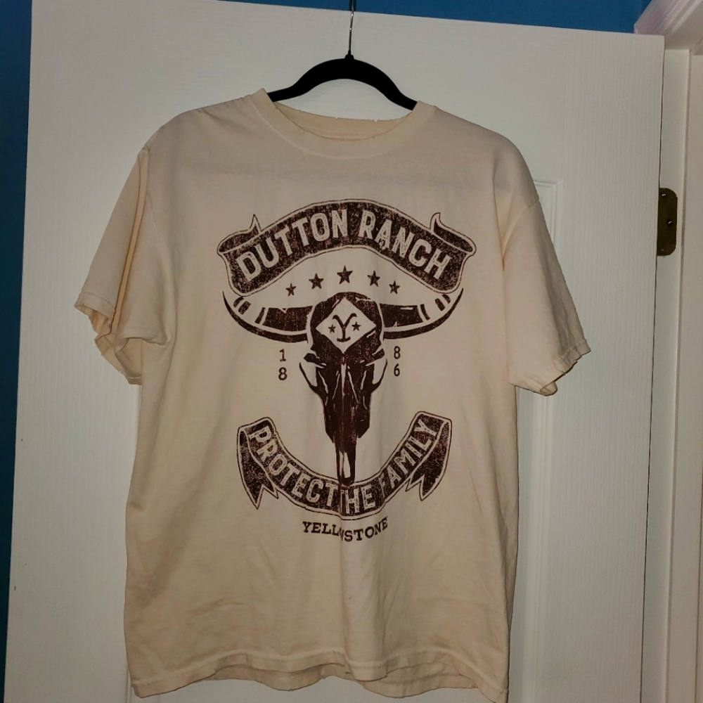 Tee shirt. Size medium.  Dutton Yellowstone.Distressed collar and sleeves